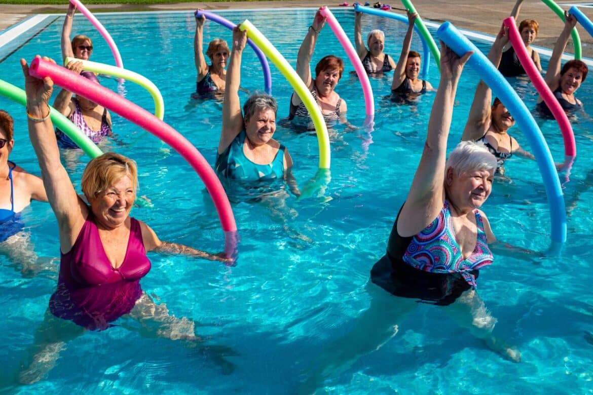 Senior people exercising in the pool